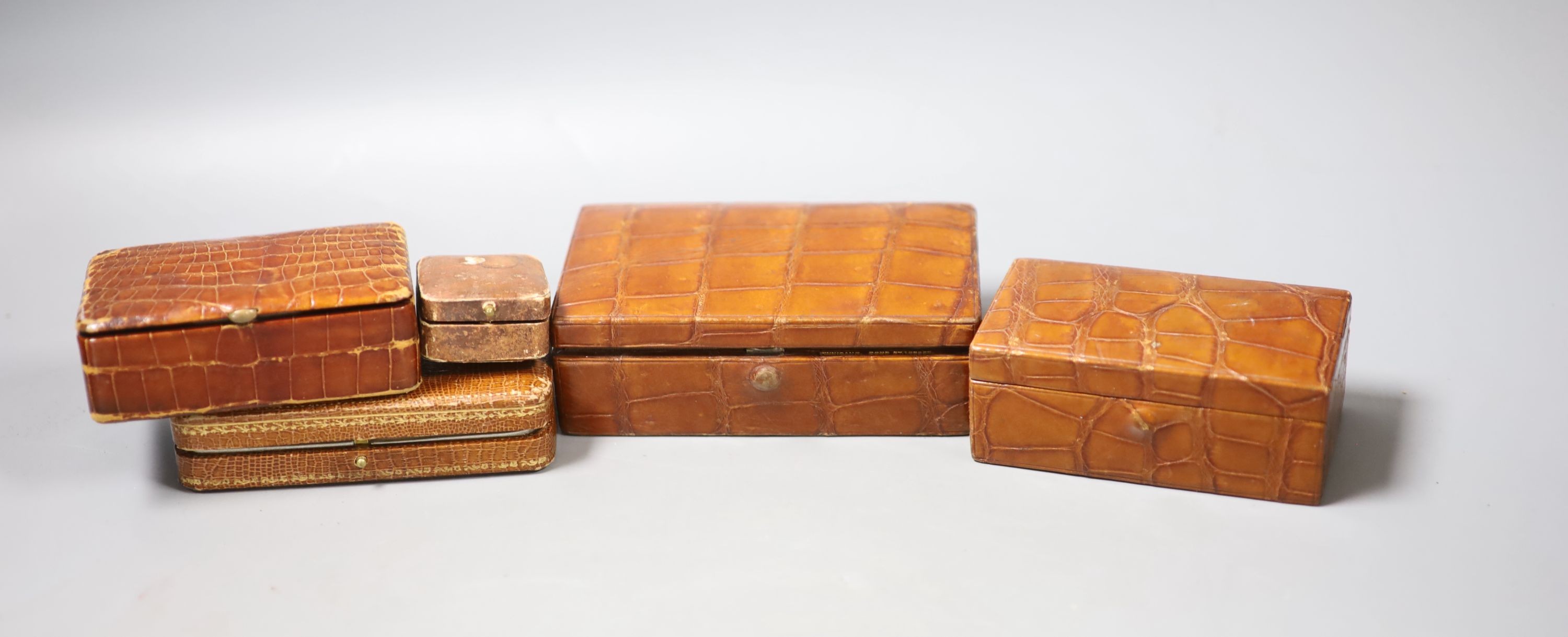 Five assorted boxes including two crocodile skin boxes by Finnigans, early 20th century, largest 13cm